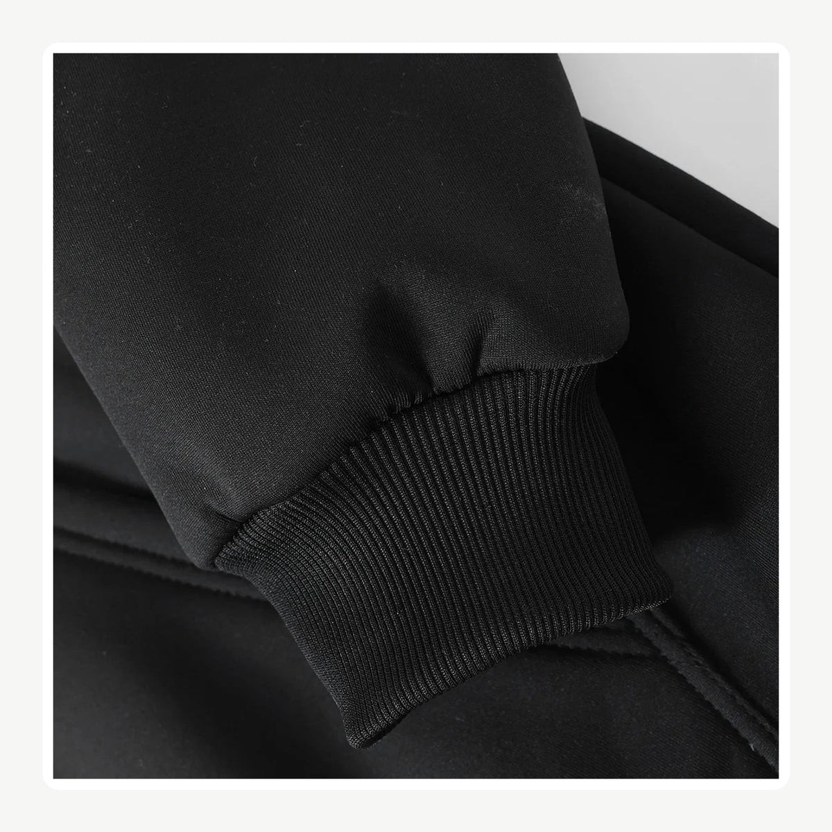 Black hoodie ribbed sleeve cuff detail