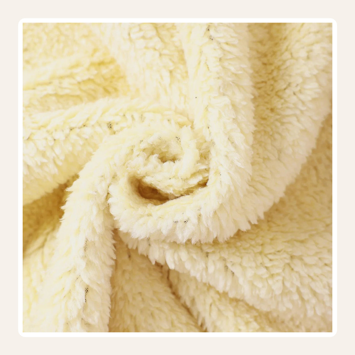 Cream sherpa fleece lining close-up