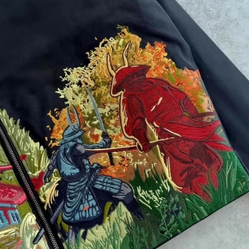 Close-up of red and blue samurai artwork on black fabric