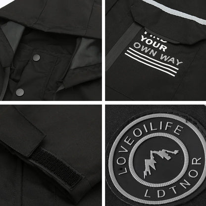 Black jacket construction details showing pocket, cuff and decorative fabric patches