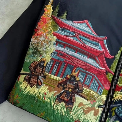 Close-up of red Japanese castle artwork on the black jacket