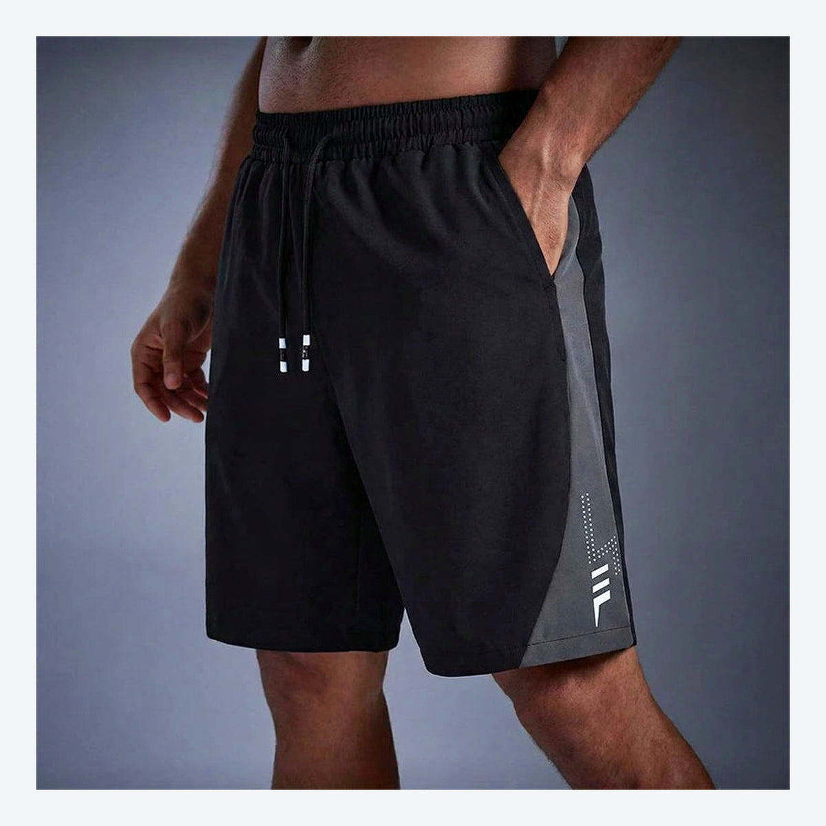 LetsBorn men's training shorts — black on model