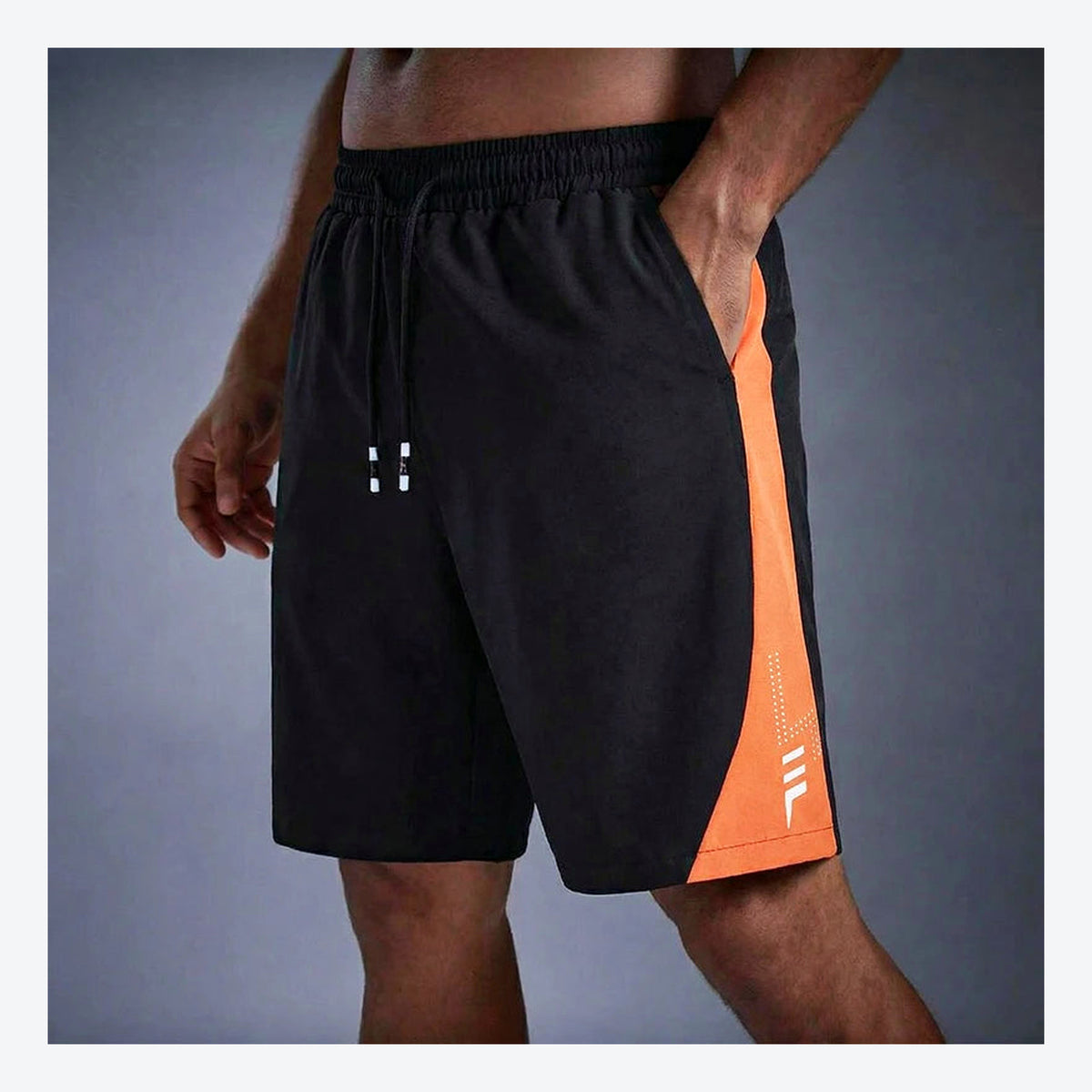 LetsBorn men's training shorts — orange on model