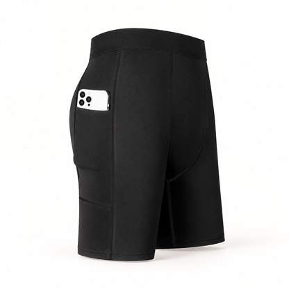 Black men’s compression shorts with plain waistband and side pocket; phone shown as a demonstration prop, not included.