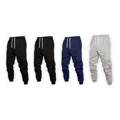 Four pairs of joggers: two black, one navy and one light grey