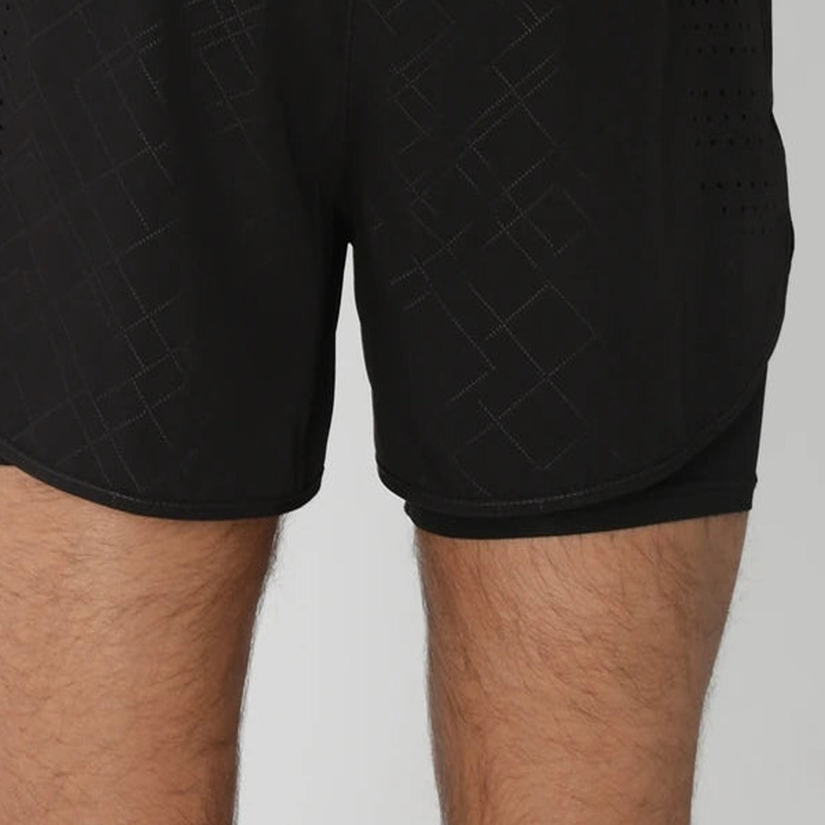 Rear view of the curved outer hem with the inner layer visible below.